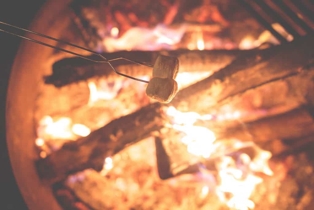 Photo of Marshmellows above campfire