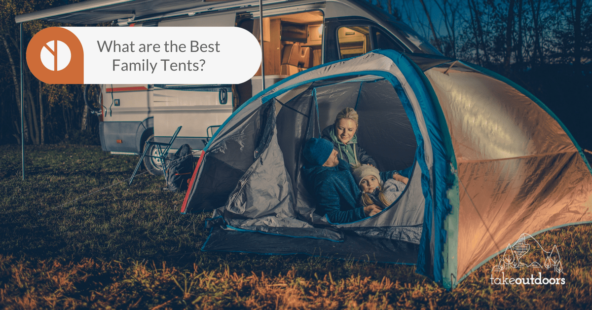 Picture of a tent with a family inside beside a campervan